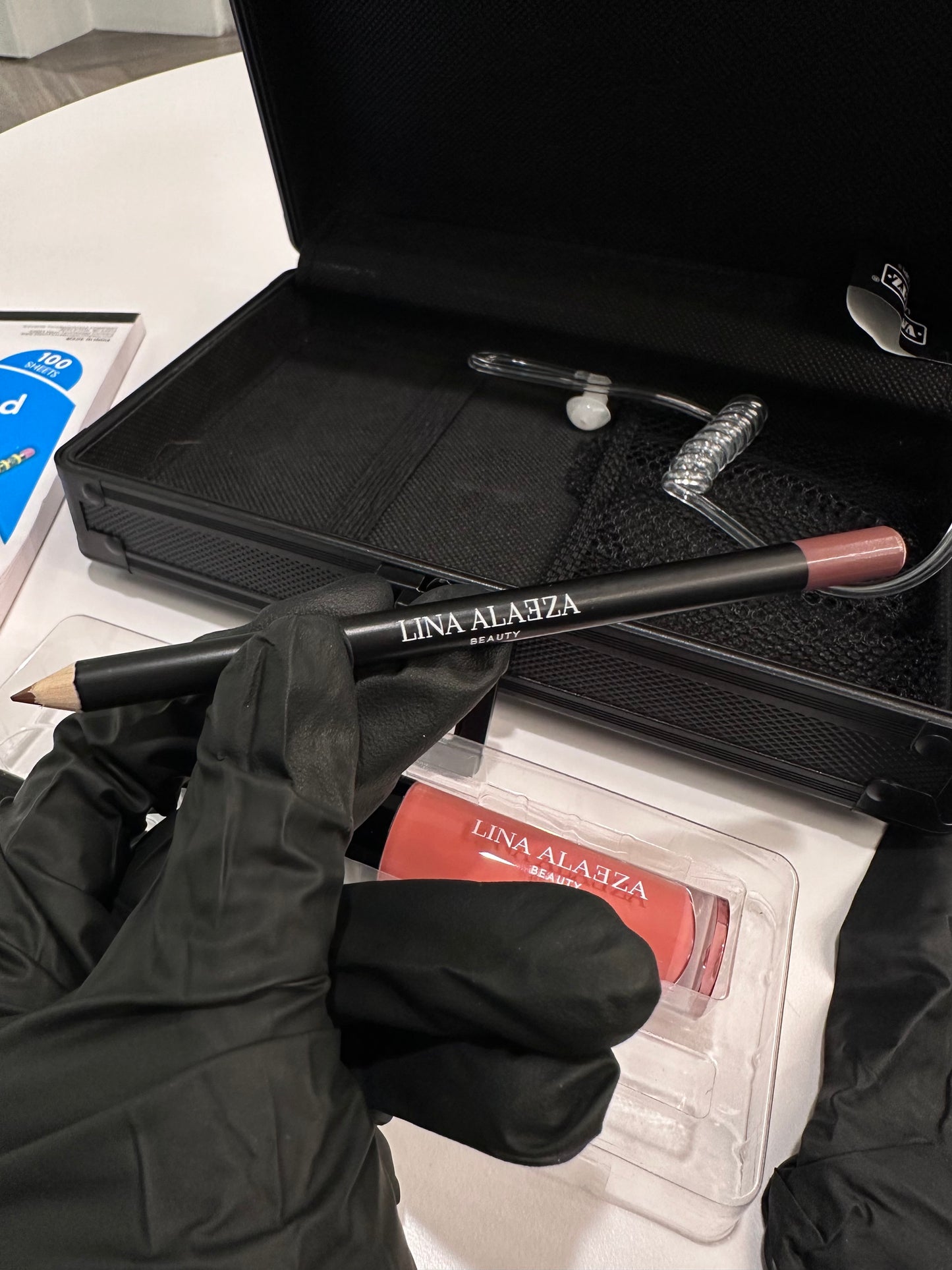 "Close up of Pink Alibi medium lipliner and gloss"